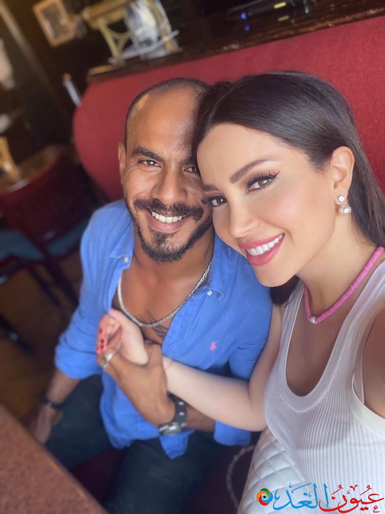 الفنانة نسرين طافش وزوجها