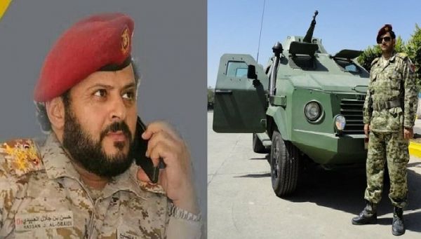 العبيدي بجوار إحدى المدرعات المصنوعة محليا